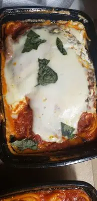 Sal's NY Italian Kitchen of Georgetown signature dishes Grandma's PizzaPenne alla VodkaChicken Francese